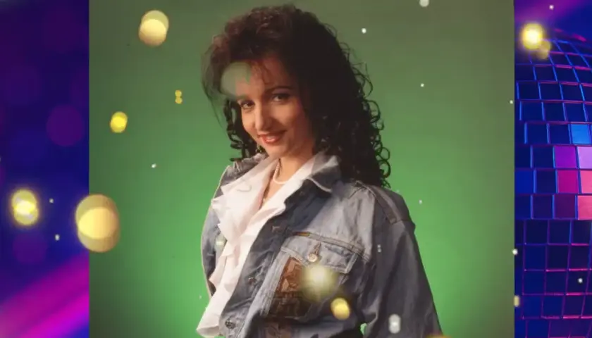 Kobieta w dżinsowej kurtce, styl lat 80. i 90. Idealna na listę disco polo.