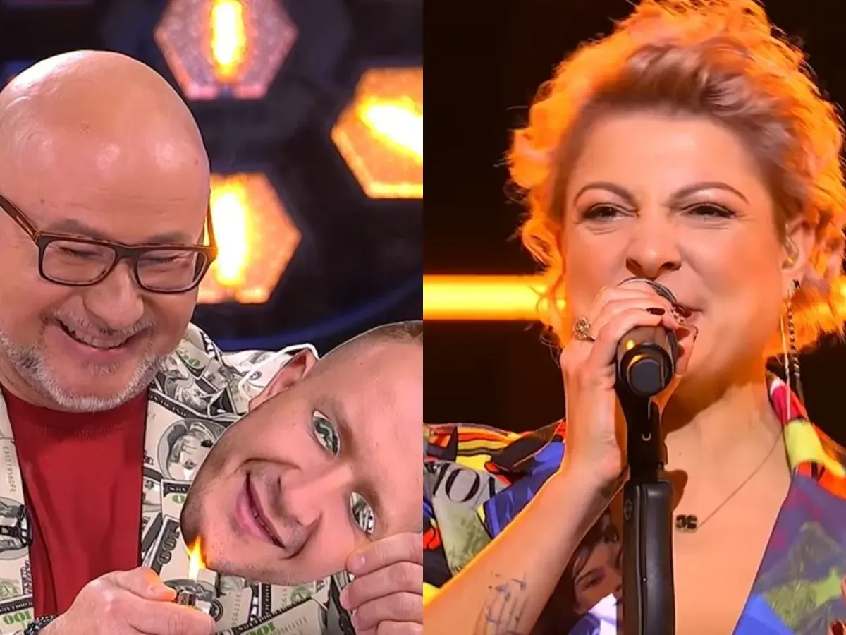 Zabawny moment z programu, gdzie mężczyzna z maską na twarzy zapala ją zapalniczką, podczas gdy kobieta śpiewa. To jak vox piosenki alfabetycznie, ale z humorem.