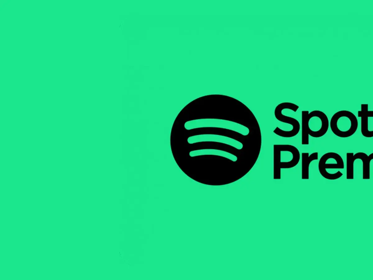 Logo Spotify Premium na zielonym tle. Czy Spotify jest za darmo? Sprawdź opcje!